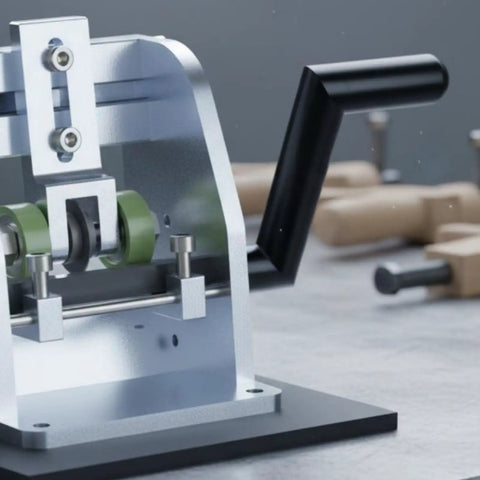 Portable Edge Tape Slitter and Edge Banding Cutter for woodworkers, metal hand-crank tool on workbench, 80mm width