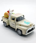 Beige metal truck decor with mini rabbits and color eggs, vintage farmhouse tabletop pickup car ornament for spring Easter.