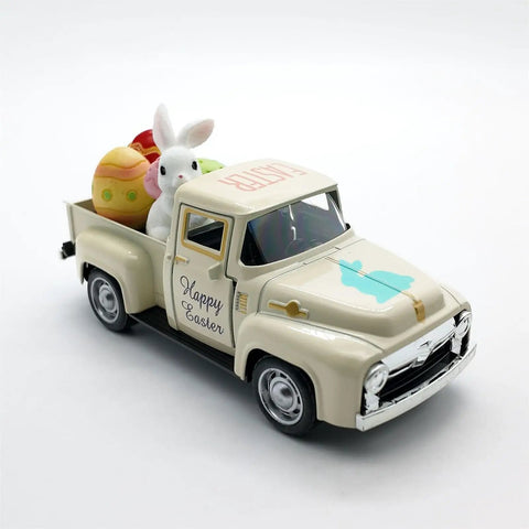 Beige metal truck decor with mini rabbits and color eggs, vintage farmhouse tabletop pickup car ornament for spring Easter.
