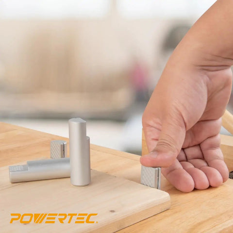 Rock Solid Workbench Clamp Set For Woodworking Holds Your Boards Tight Includes two holdfasts placed on wood surface.