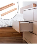 Full Extension Drawer Slides in Solid Wood with Bottom Mount Glides, shown with open drawer next to bed.