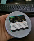 High Visibility Silver Reflective Sew On Fabric Tape Strips For Clothing Edging, 1 Inch By 20 Yards, in hand
