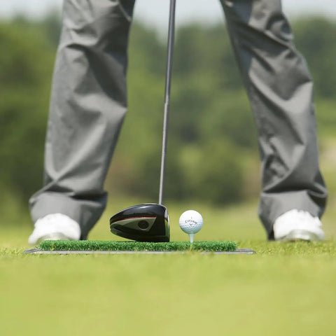 Golfer using Backyard Golf Hitting And Putting Mat With Rubber Backing For Real Course Feel And Everyday Practice 1x2 Foot