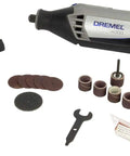 Badass Corded Rotary Tool Kit Featuring Variable Speed Control And Slim Ergonomic Grip With 28 Hella Tough Attachments laid out on a table.