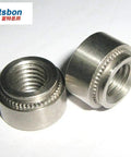 Close-up of Hardcore Self Clinching Rivet Nuts One Thousand Piece Bulk Pack Top Shelf Stainless Steel Threaded Panel Inserts.