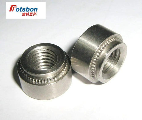 Close-up of Hardcore Self Clinching Rivet Nuts One Thousand Piece Bulk Pack Top Shelf Stainless Steel Threaded Panel Inserts.
