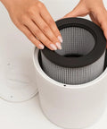 Hands installing a 3 In 1 True HEPA Activated Carbon Filter Replacement For Bissell MYair Purifier 2780A 2780 27809 Not For 3139A