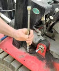 Mechanic using Grease Joint Cleaning Kit For Flushing Hardened Grease From Shafts And Bushings Pro Grade Tool on machinery
