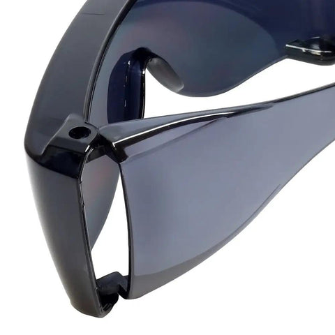 Close-up view of Fitover Safety Glasses With Uni Lens Smoke Wraparound Eye Protection No Fog Scratch Resistant Protective Eyewear For Full Coverage And Clear Wide Vision Go To Gear showing side frame and lens detail.