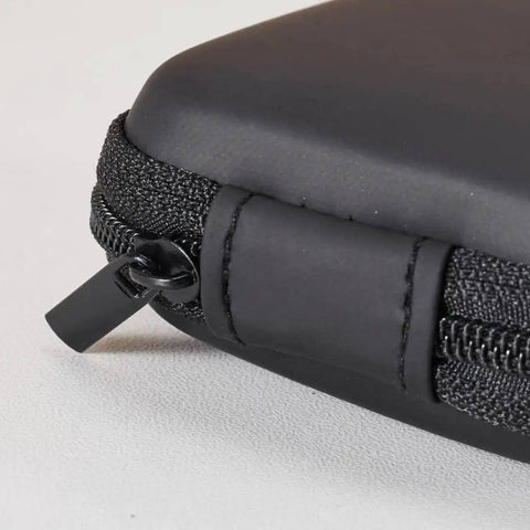 Close-up of the heavy-duty zipper on the Slick Squared Eva Hard Shell Organizer Pouch For Earbuds Charging Cables Keys And Coins.