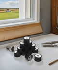 Rubber Shock Absorber Mounts For Noise Reduction And Vibration Damping In Industrial And Factory Environments 12 Pack With Heavy Duty Double Ended Threaded Cylindrical Design Durable Anti Vibration Feet And Washers, black rubber mounts on a workbench