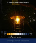 Outdoor Dusk to Dawn LED Bulb 8W 100W Equivalent illuminating in a vintage lantern, emitting 2700K soft white light for a cozy atmosphere.