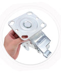 Badass Heavy Duty Swivel Caster Bracket 4 Inch Rotatable Steel Wheel Frame With Brake held in hand, showing robust design and frame.