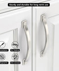 10 Pack Brushed Satin Nickel Cabinet Pulls With 4 Inch Hole Centers Arch Style Handles installed on white cabinet doors.