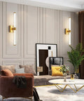 Living room with Golden Vanity Light Fixture Over Mirror 360 Degree LED Bath Bar 22 Inch, brushed gold and glass accents.
