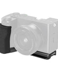 Silicone L Shape Hand Grip for Sony Alpha 6700 Camera With Built-In Arca-Swiss Quick Release Plate and Wrist Strap Slot attached.