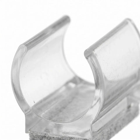 Close-up of U Shaped Chair Leg Caps with Felt Pads and Floor Glides for Tubular Furniture Feet, clear plastic