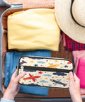 Cartoon Aircraft Clouds Toiletry Bag With Hanging Hook Large Capacity Travel Makeup And Shaving Kit Organizer held over suitcase