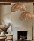 YAXDQUW Irregular Shaped Rattan Pendant Light Hand Woven Wicker Hanging Ceiling Lamp Adjustable Cord Chandelier E27 Boho Light Fixture for Living Room Dining Room Farmhouse Cafe Home Decoration in a cozy interior.