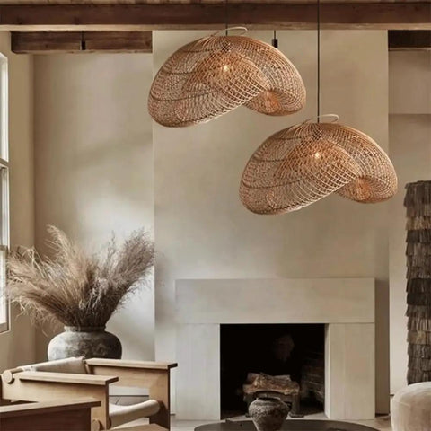 YAXDQUW Irregular Shaped Rattan Pendant Light Hand Woven Wicker Hanging Ceiling Lamp Adjustable Cord Chandelier E27 Boho Light Fixture for Living Room Dining Room Farmhouse Cafe Home Decoration in a cozy interior.