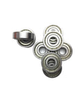 Check Out These Awesome 2 Pack Of 6205ZZ Deep Groove Ball Bearings Measuring 25 By 52 By 15 Millimeters With Abec Three Precision Rating Designed For Heavy Duty Industrial Drilling Applications That Need To Get It Done Without Any Wobbling Or Friction - group of ball bearings on a white background.