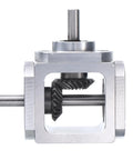 uxcell 90-degree bevel gear box with aluminum frame; 1:1 ratio; 6mm shaft; left input, top output, gears visible
