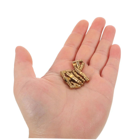 Solid Brass Pro Grade Hidden Hinges Set for Keepsake Boxes and Wooden Cabinets in a hand, cylindrical invisible barrel design.