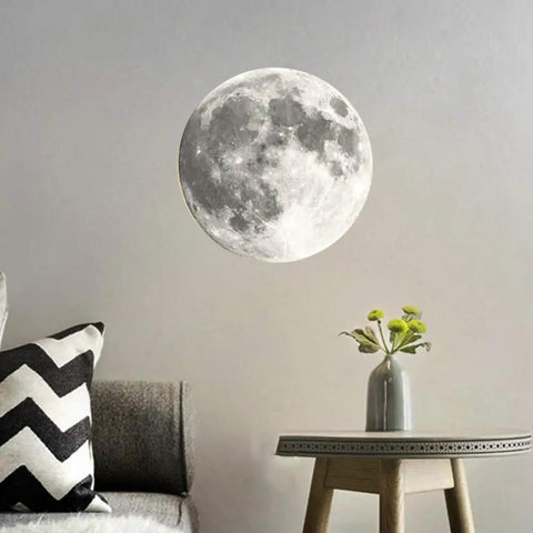3D Moon Lamp LED Moon Light With Remote Control 12 Moon Phases 10 Inch Night Light mounted on wall above table and couch