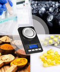 Portable Jewelry Scale 50g Capacity 0.001g Precision Microgram And Milligram Scale For Powder With Tray Tweezers And Calibration Weight Includes Carry Case shown with various powders and pills.