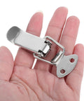 10PCS Sleek Silver Stainless Steel Toggle Latch With Spring Loaded Lock For Storage Cases And Travel Bags Easy Installation shown in hand