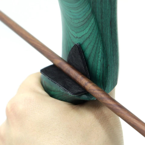 Leather arrow rest plate with adhesive on recurve bow, part of Bow String Silencers Set For Recurve And Traditional Longbows