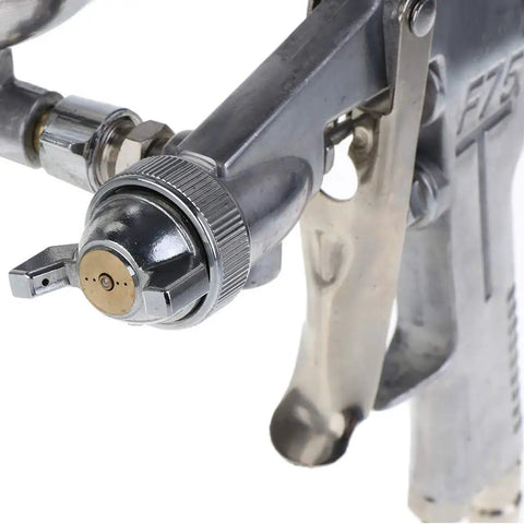 Close-up of F75 Pneumatic Paint Sprayer with 1.5mm nozzle and adjustable air knob for auto body work and furniture polish.