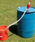 Hassle Free Plastic Drum Siphon Pump Works Like A Charm With Five Gallons Per Minute Flow Rate connecting blue drum to red bucket.
