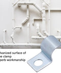 Built Tough 20 Pack Single Hole Pipe Clamp Kit with zinc plated stainless steel clamp next to white pipes on wall
