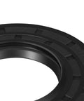 Close-up view of black seal from Washer Seal And Bearing Replacement Kit For Tub And Drum Shaft Assembly Repair Includes Outer Rear Tub And Compatibility With DC97-17004A B E DC97-17040B DC62-00156A DC97-19636A And WF393 WF395 WF24H WF42H WF405 Models