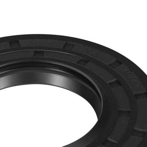 Close-up view of black seal from Washer Seal And Bearing Replacement Kit For Tub And Drum Shaft Assembly Repair Includes Outer Rear Tub And Compatibility With DC97-17004A B E DC97-17040B DC62-00156A DC97-19636A And WF393 WF395 WF24H WF42H WF405 Models