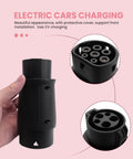 Rock Solid Type One To Type Two EV Charger Adapter Meets Sae J1772 Standards And Ip54 Weatherproof Rating For Any American Electric Ride With Sealed Safety Pins In Sleek Black Finish, held in a hand.