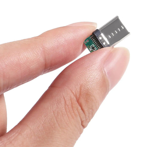 Close-up of Usb C Connector Kit With 40 Pin Breakout Board USB 3.1 Type C Female And Male Sockets For Soldering Wire And Cable held in fingers