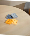 Four Piece Miniature Dollhouse Platter Set With Realistic Four Grid Resin Box For Candy And Nuts displayed on round table