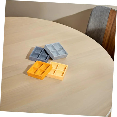 Four Piece Miniature Dollhouse Platter Set With Realistic Four Grid Resin Box For Candy And Nuts displayed on round table