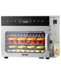 Six Tray Stainless Steel Food Dehydrator With 400W Power, Adjustable Temperature, And 24 Hour Timer displaying dehydrating fruit