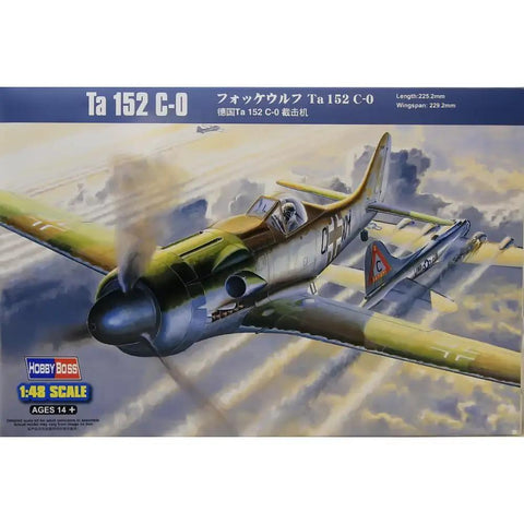 Box art of Ta 152C-0 Fighter Aircraft 1/48 Scale Kit With Dope Photo-Etch Details flying over clouds.