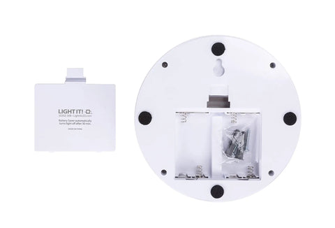 Back view of Luna LED Tap Light White Battery Operated Tap On Tap Off 35 Lumens showing battery compartment, wireless.