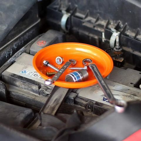 Magnetic Parts Tray Set With Two Magnetic Bowls And Telescopic Magnetic Pick Up Tool For Easy Garage Organization Holds Nuts And Bolts And Small Parts Reaches Up To 25.3 Inches Keeps Your Tools Neat And Ready; orange magnetic bowl on engine holding screws and nuts.