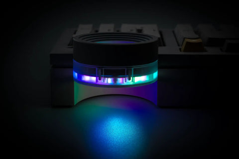 Close-up view of RGB lighting on a hot swappable key switch for 98 Key Silent Mechanical Keyboard With Hot Swappable RGB Lighting And Tri Mode Wireless Setup Giving You A Smooth As Butter Typing Experience Straight Up Built For Gaming Or Daily Grind Use In Night Ink.