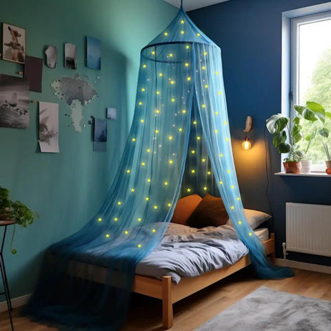 Glow In The Dark Stars Canopy Bed For Girls With Galaxy Lights And Princess Net Tent installed over a bed in a blue room.