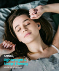 Slick Wireless Earbuds For Small Ears Bluetooth 5.3 Ultra Lightweight At 3.7 Grams Per Bud worn by a woman sleeping peacefully.