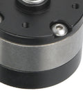Close-up of VGEBY1 gear reducer for RC 540 motor; black top plate, silver housing, mounting screws visible.