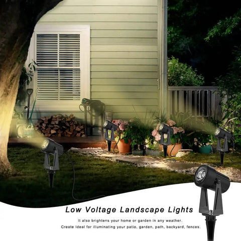 Low Voltage LED Landscape Lights Kit With Transformer IP65 Waterproof Outdoor Spotlight illuminating house at night