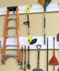 Heavy Duty PVC Slatwall Garage Organizer System 8 Ft By 4 Ft White Panels For A No-Fuss 32 Sq Ft Setup, Interlocking Slatwall Panels, Holds Up To 75 Lb Per Sq Ft, Includes Trims And Hardware For Stud Or Drywall Installation in use with tools hung